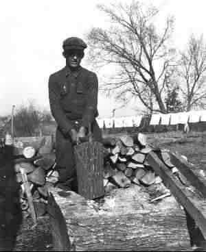 Bonnie Crawford chopping wood